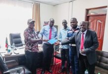 Collins Mukhongo hands over, advises new CECM Roads and Infrastructure on how to tackle cartels