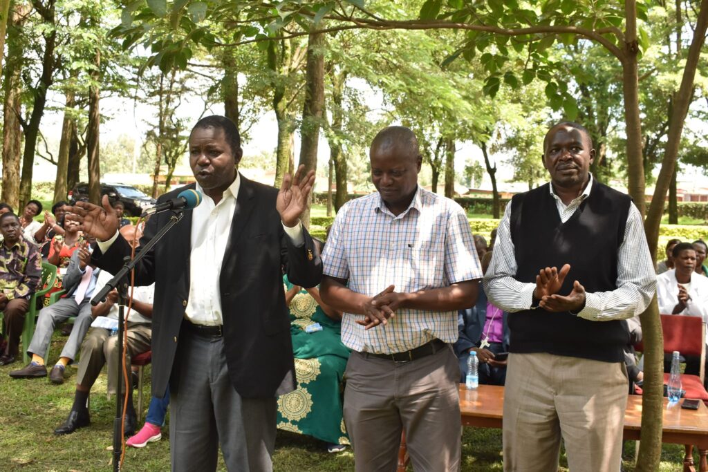 L-R: Board of dorectors Chairman Hon. Alfred Khang'ati introducing the Outgoing and incoming MDs