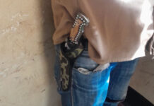 IMAGES: Bungoma Police arrests civilian in Police uniform with a dagger at Soko-Kubwa